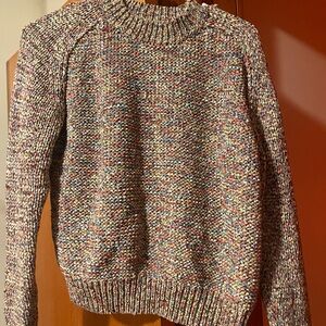 COS multicolor knit sweater. Has small pull in the shoulder as pictured.